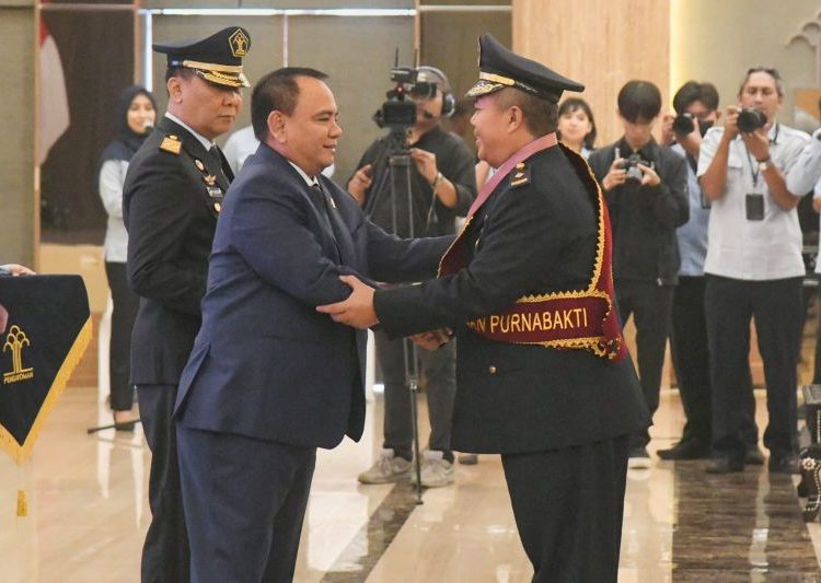 Wisuda pegawai purnabakti di lingkungan Kementerian Hukum dan HAM Republik Indonesia di Graha Pengayoman Kemenkumham, Senin (7/8/2023).*/Dok-Humas Kemenkumham